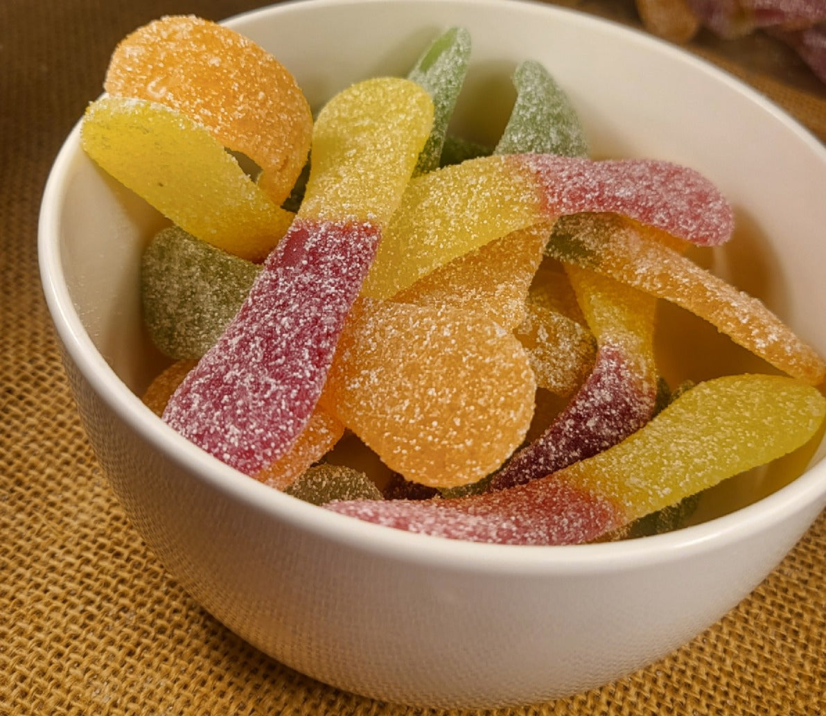 Bonbon en forme de Surf aux gout fruité de la marque Haribo dans la boutique Ali Bonbec en deux version  100g et 500g
